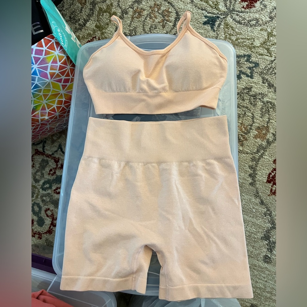 Two workout sets bra top and biker shorts